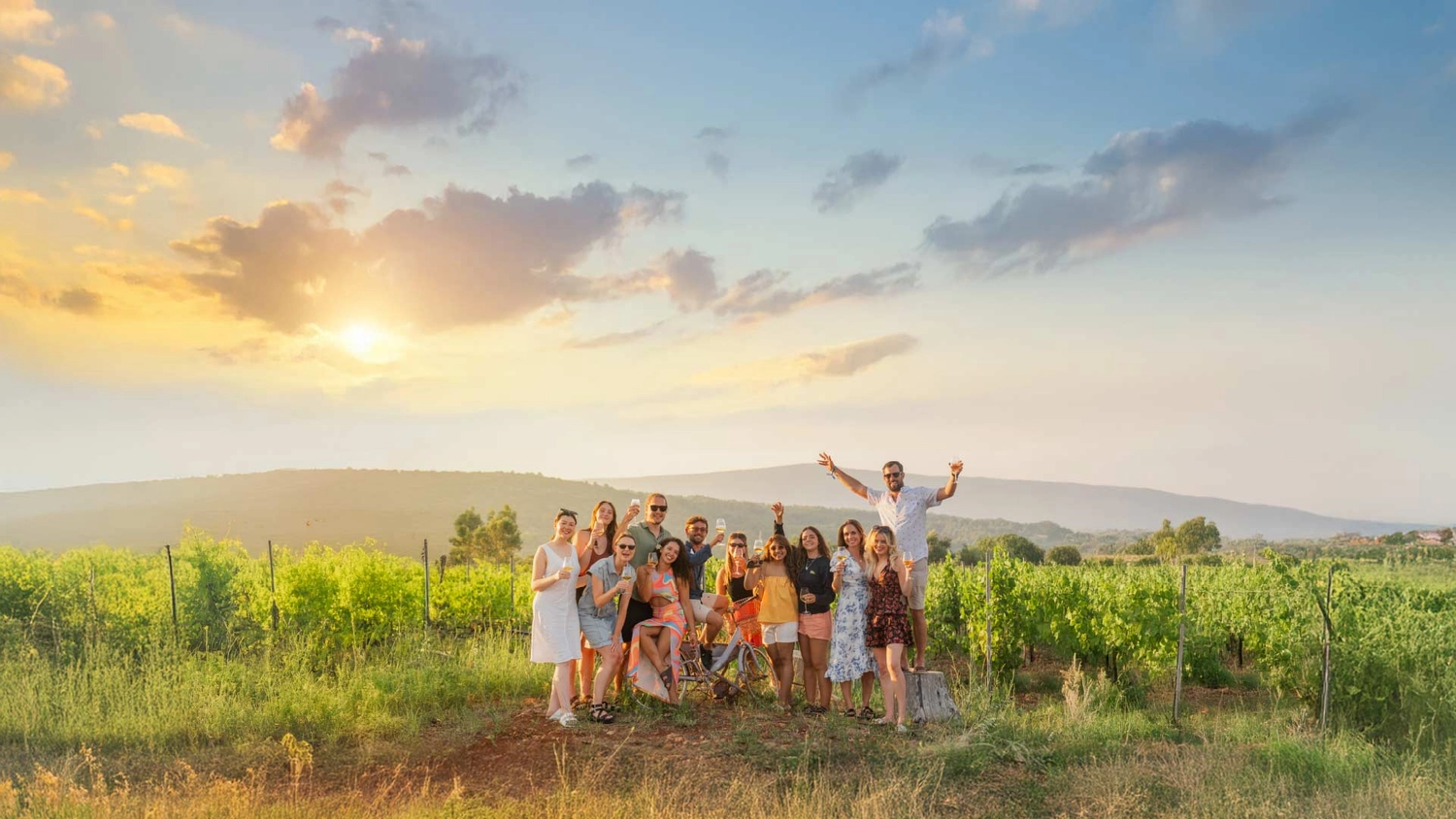 Group of friends pose for a photo at Hora Farm Vineyard in Croatia