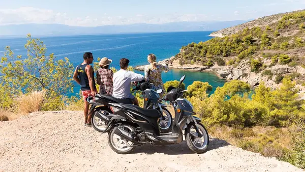 Group of people look at the view in Corfu