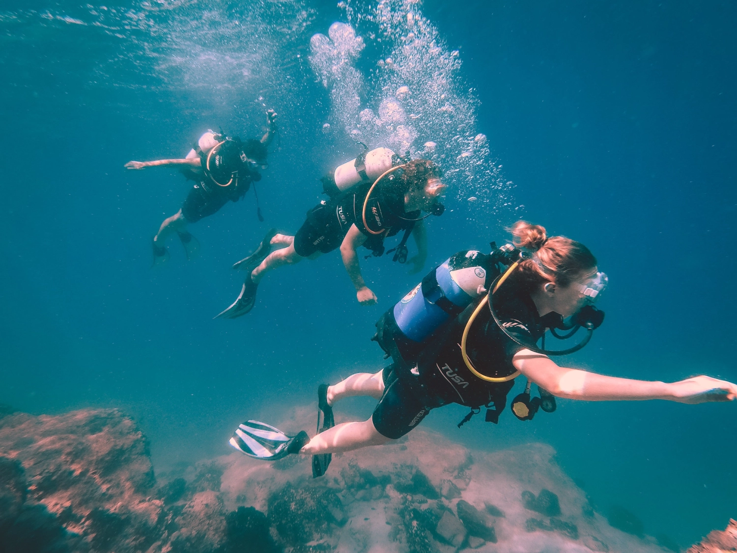 Group Scuba diving in Saraonic Islands in Greece