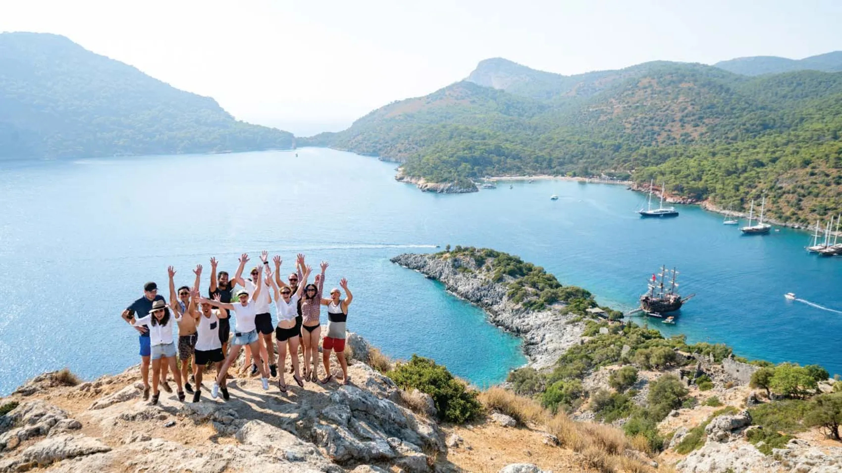 Group of people explore one of the islands at Skopea Limani