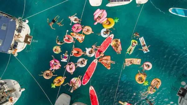 Group of people on floaties in Greece