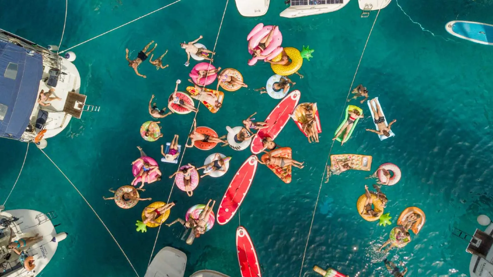 Group of people on floaties in Greece