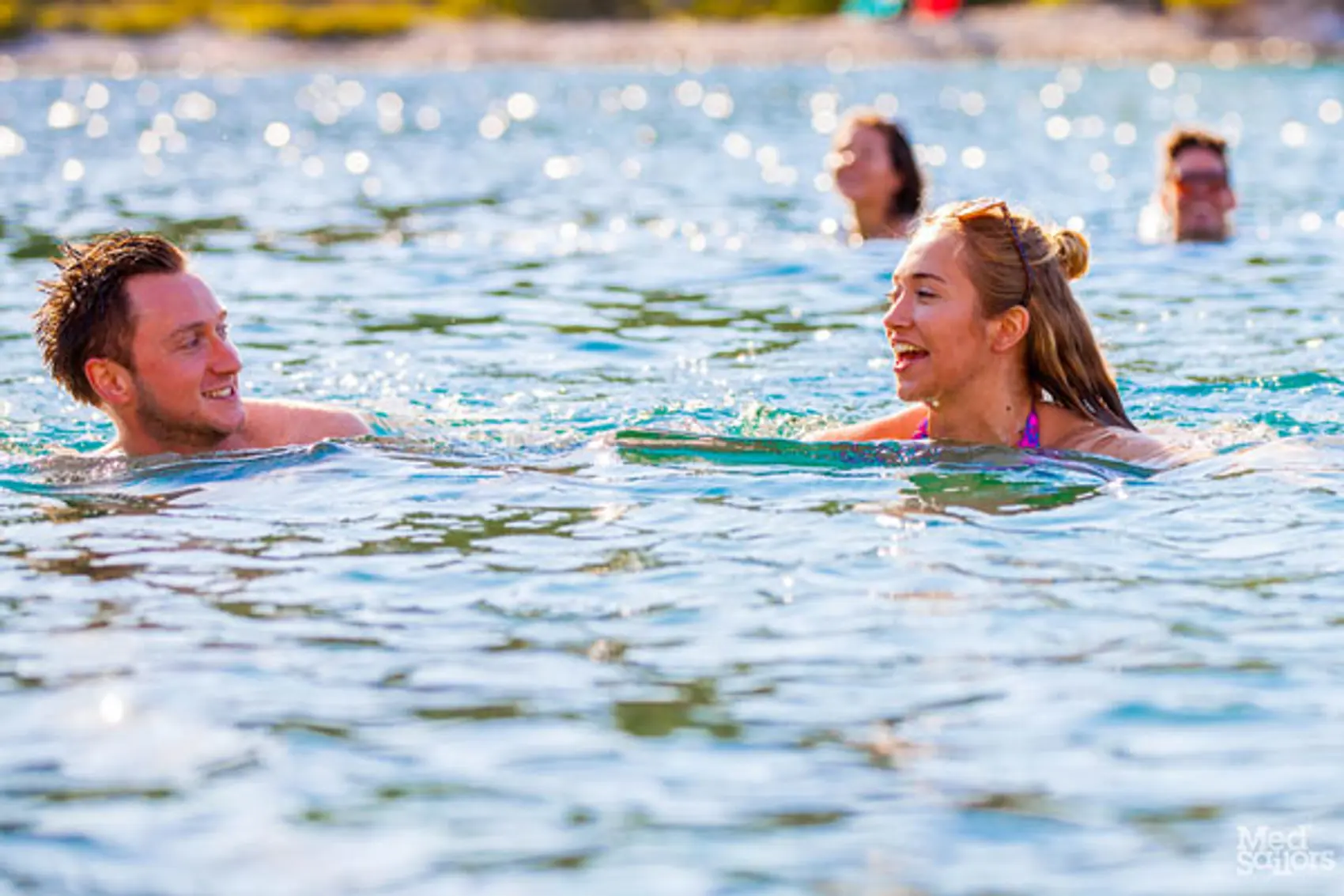 Sailing holiday activity options - Going for a dip at the beach