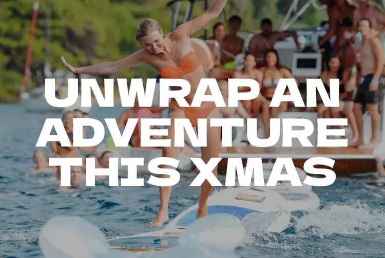 Woman running over some paddle boards