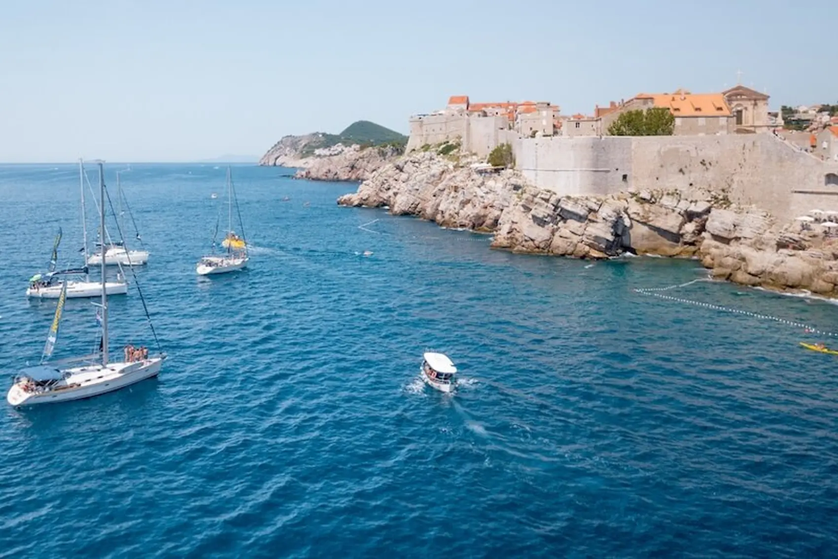 Aerial photo of Dubrovnik Old Town with MedSailors island hopping in Croatia on a yacht week in summer.