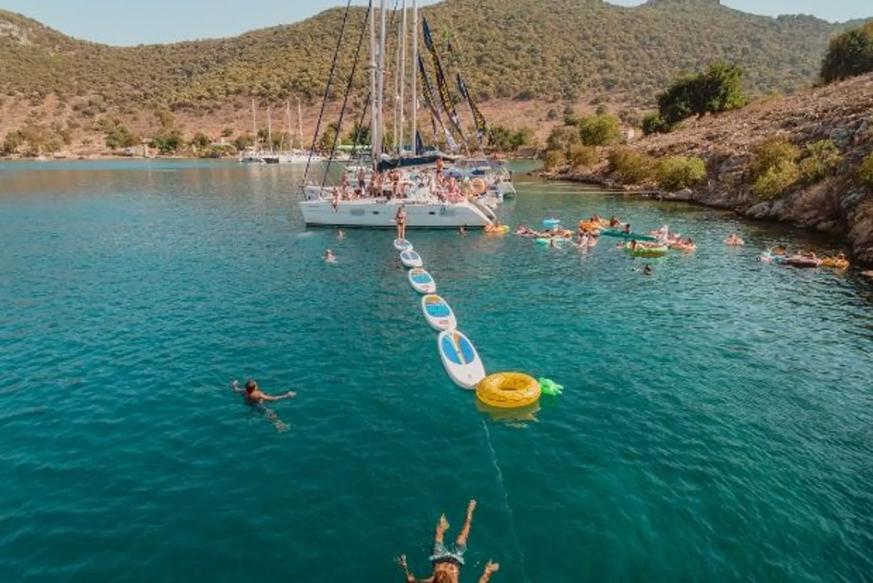 Boats and guests in beautiful bay