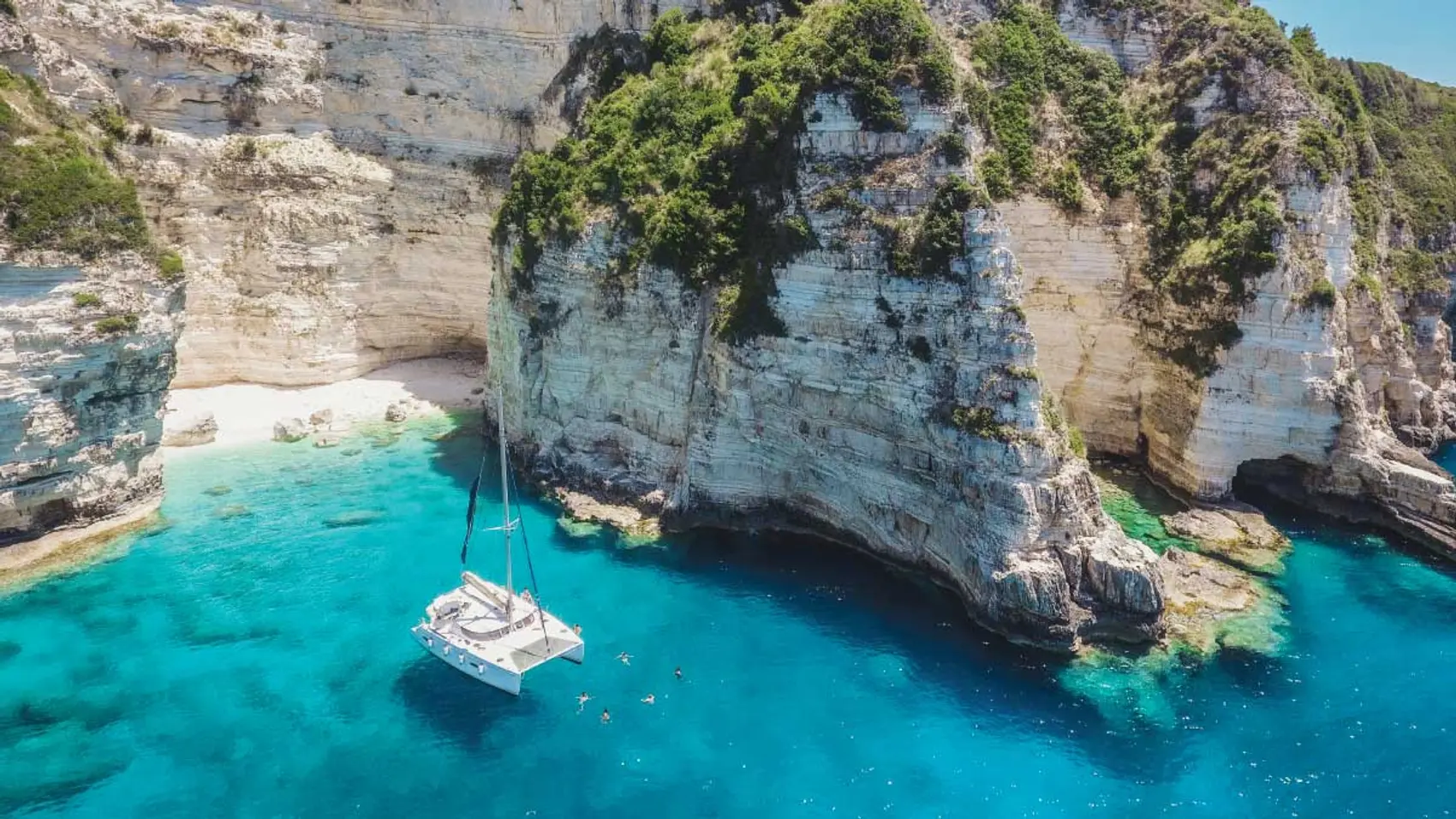 MedSailors catamaran anchored at the blue caves in Antipaxos