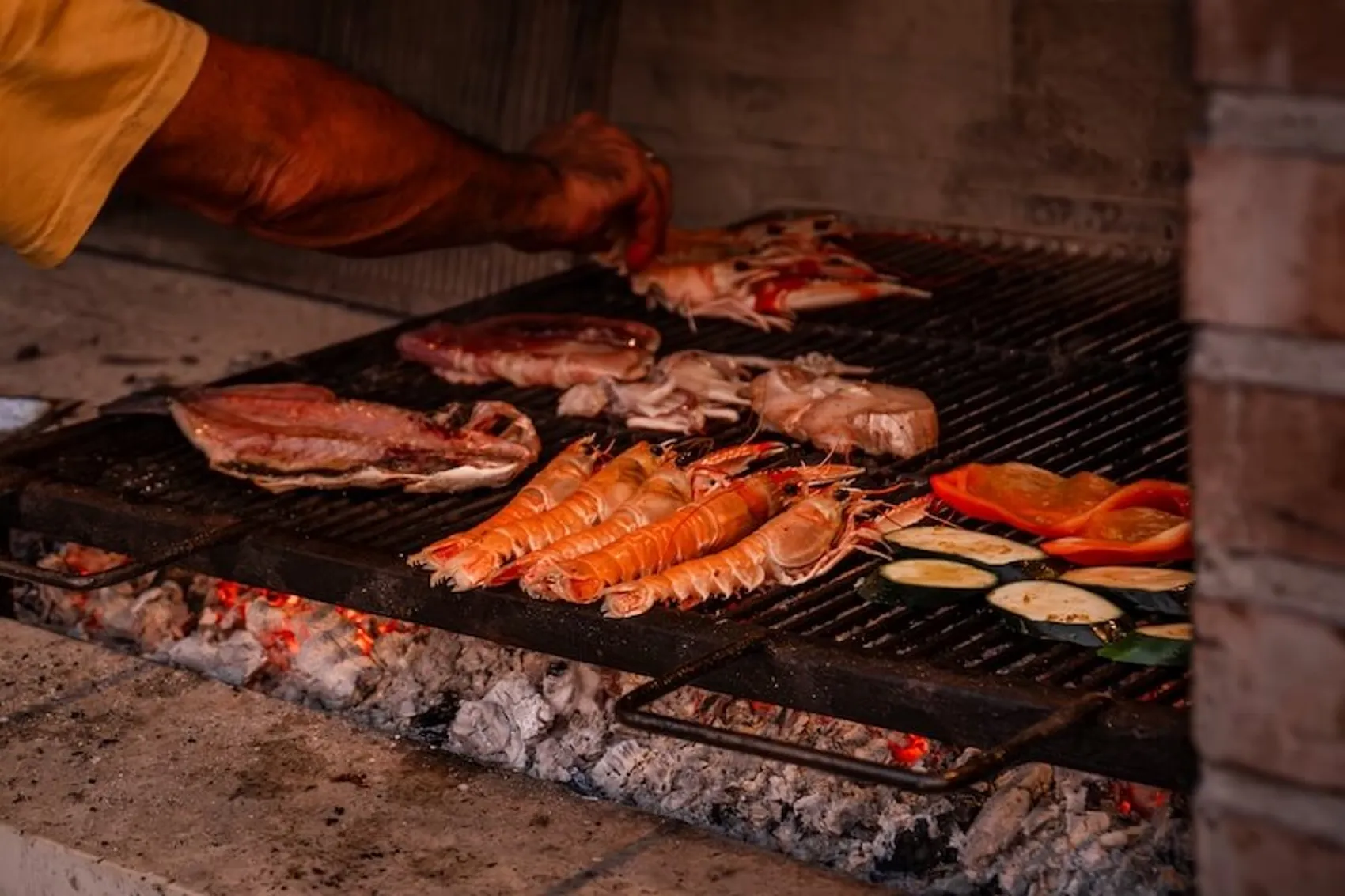 Seafood cooking on an open grill in Croatia.