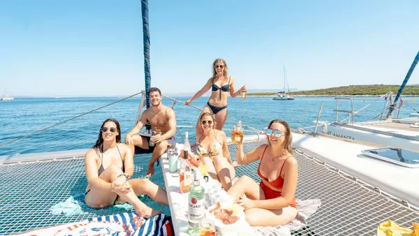 Group of friends on a catamaran in Greece