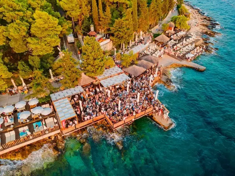 Aerial phot of Hula Hula beach bar in Hvar, one of the best party bars in Croatia and a better alternative to Ibiza and Magaluf. 