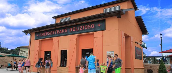 Families in front of the Cheesesteaks Delizioso concession building