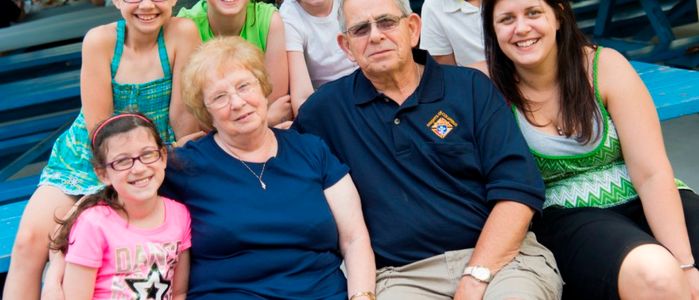 Family at picnic tables at DelGrosso's Park