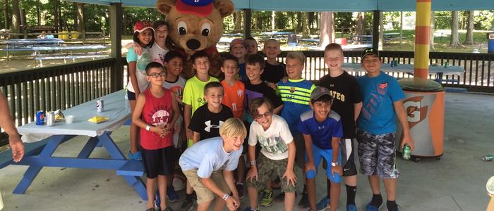 Children standing with Buddy Bear at DelGrosso's Park