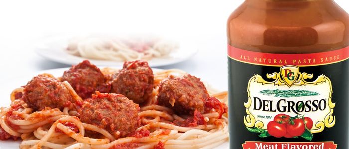 Plate of Spaghetti and meatballs with DelGrosso Sauce Jar