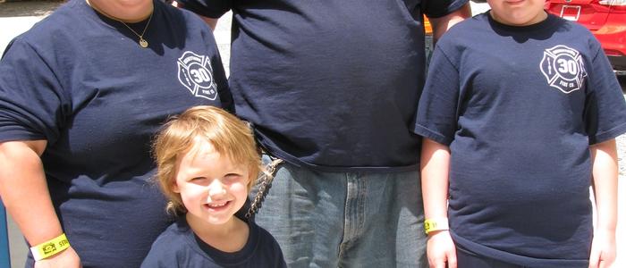 Local Firefighter and family at the park