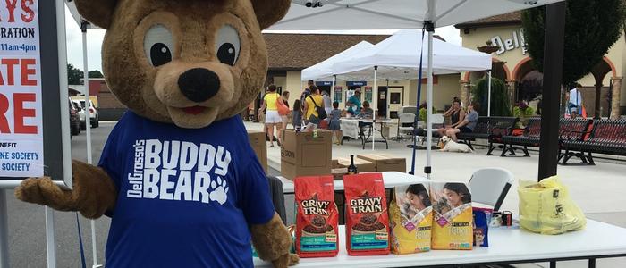 DelGrosso's Mascot Buddy Bear with the food donations