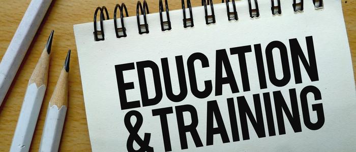 Notebook that says Education and Training