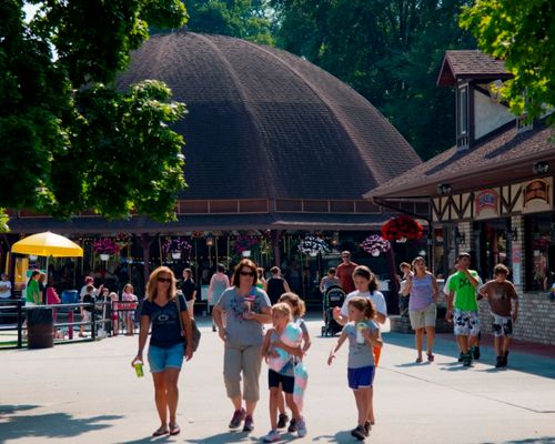 Guests walking through the Midway area of DelGrosso's Park.