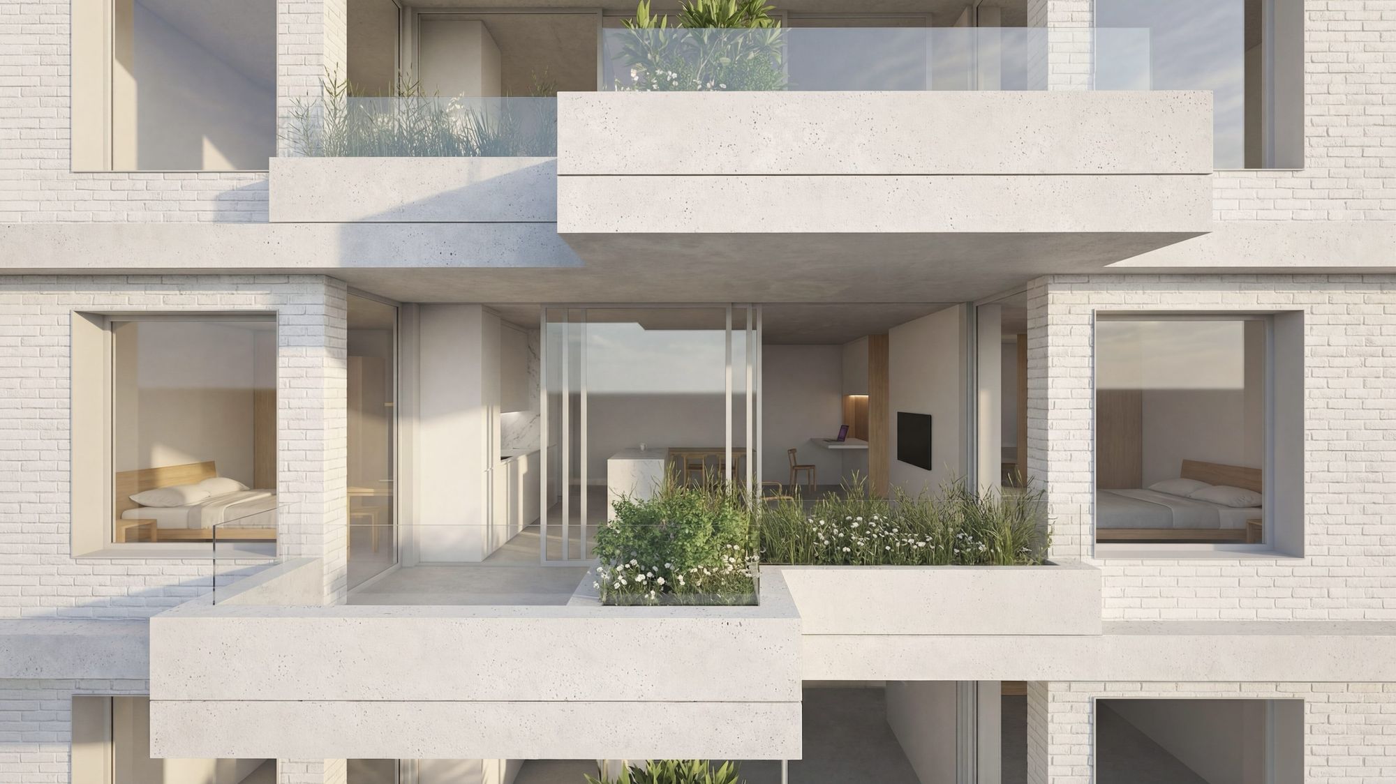Habitação para arrendamento a custo acessível em Lordelo — pormenor da fachada: as varandas-jardim em betão e o tijolo branco.