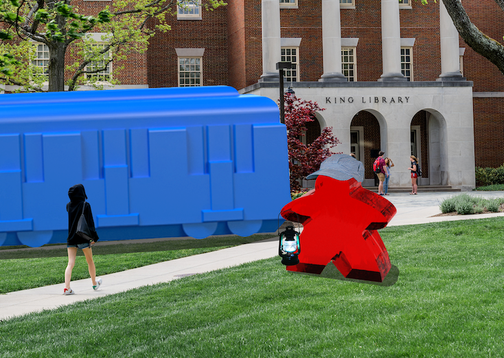 Ticket to Ride playing piece outside with Meeple conductor parked outside King Library