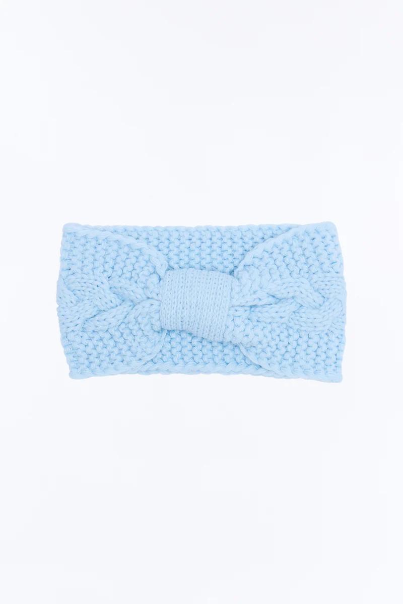Light blue cable knit headband and soft winter ear warmer head wrap.