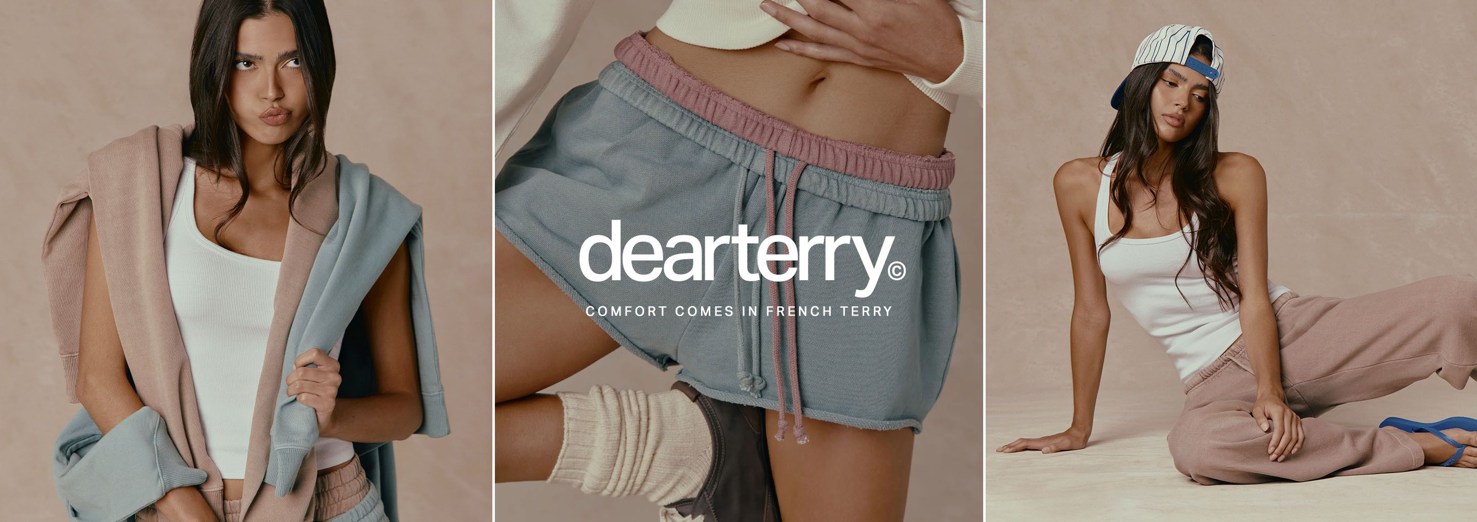 Model in blue dearterry French terry shorts with pink waistband and cream top, promoting cozy, comfortable women’s loungewear.