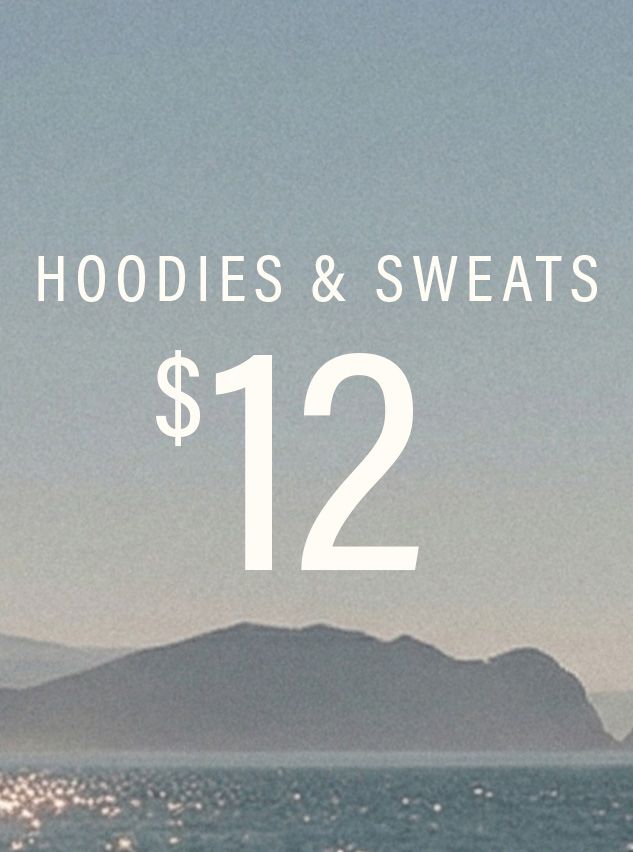 Blue-grey ocean and misty mountains. White text announces 'Hoodies & Sweats $12'. Shop this great deal on cozy casualwear.