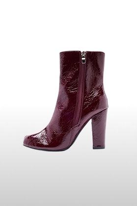 Burgundy patent leather ankle boot with a high block heel, crinkled glossy finish, and side zipper for women's autumn fashion product catalog.