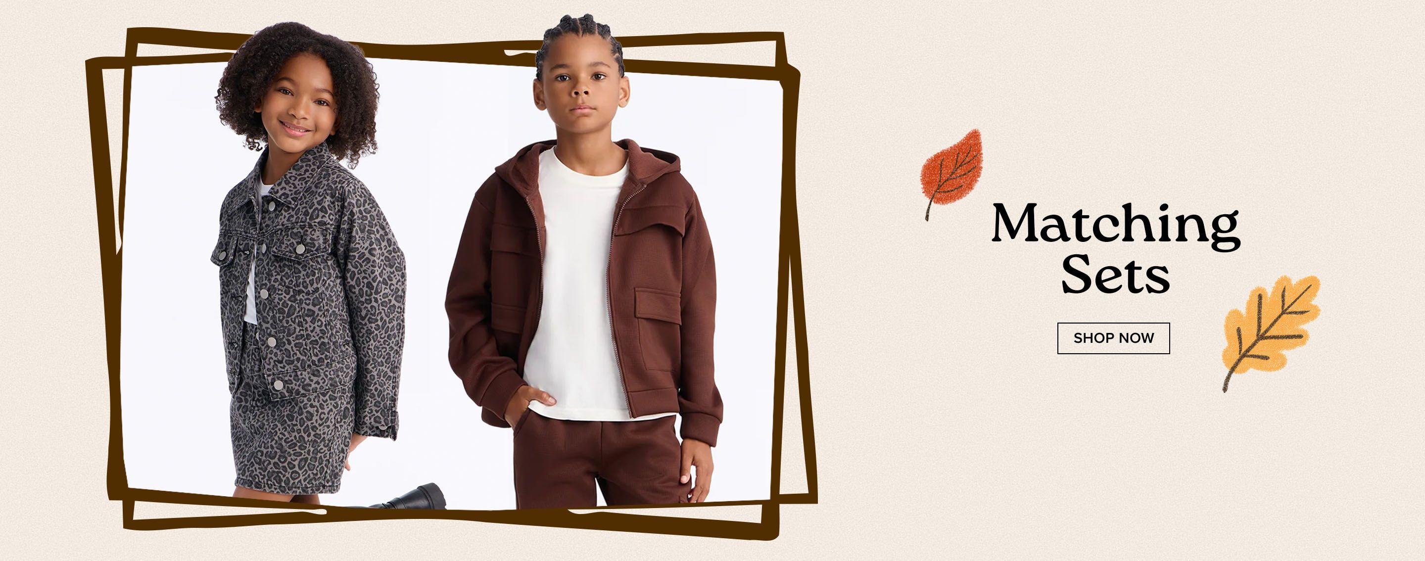 Child in a brown matching hoodie and pants set for autumn. Promotional banner for kids' clothing with text: Matching Sets, Shop Now.