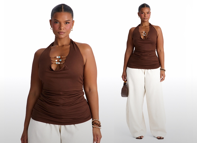 Model wears a stylish brown ruched halter top with beaded detail and cream wide-leg pants. Perfect for a chic summer resort look.