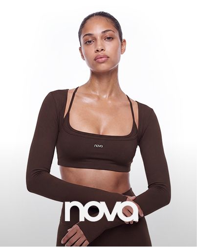 Woman in Nova brown long-sleeve crop top and matching activewear sports bra on white background promoting the new athleisure collection.