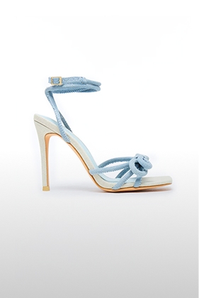 Stylish light blue ankle-strap high-heel sandal with square toe, knot detail, promoting new fashion footwear.
