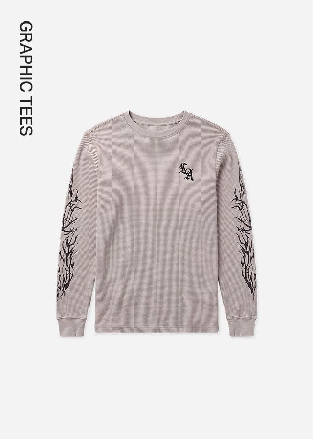 Grey long sleeve waffle knit shirt with LA chest logo and black tribal graphics on sleeves.