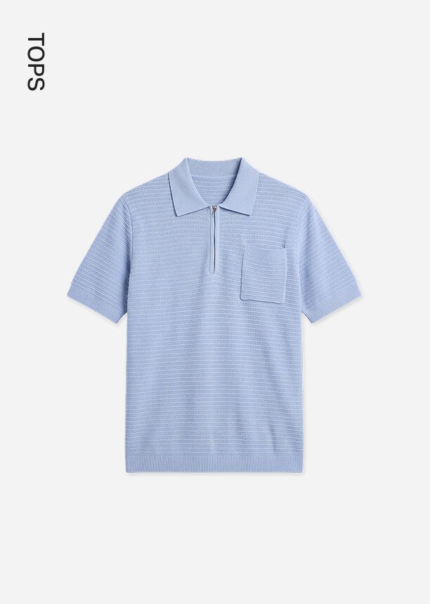 Light blue men's textured knit polo shirt with a half-zip collar and chest pocket, showcasing new arrivals in the tops collection.