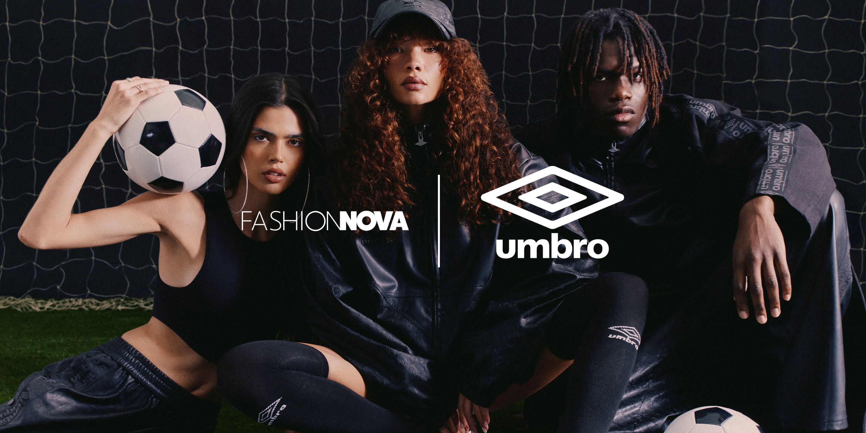 Three models in black Fashion Nova x Umbro exclusive sportswear on grass with soccer balls. New collaborative activewear collection.