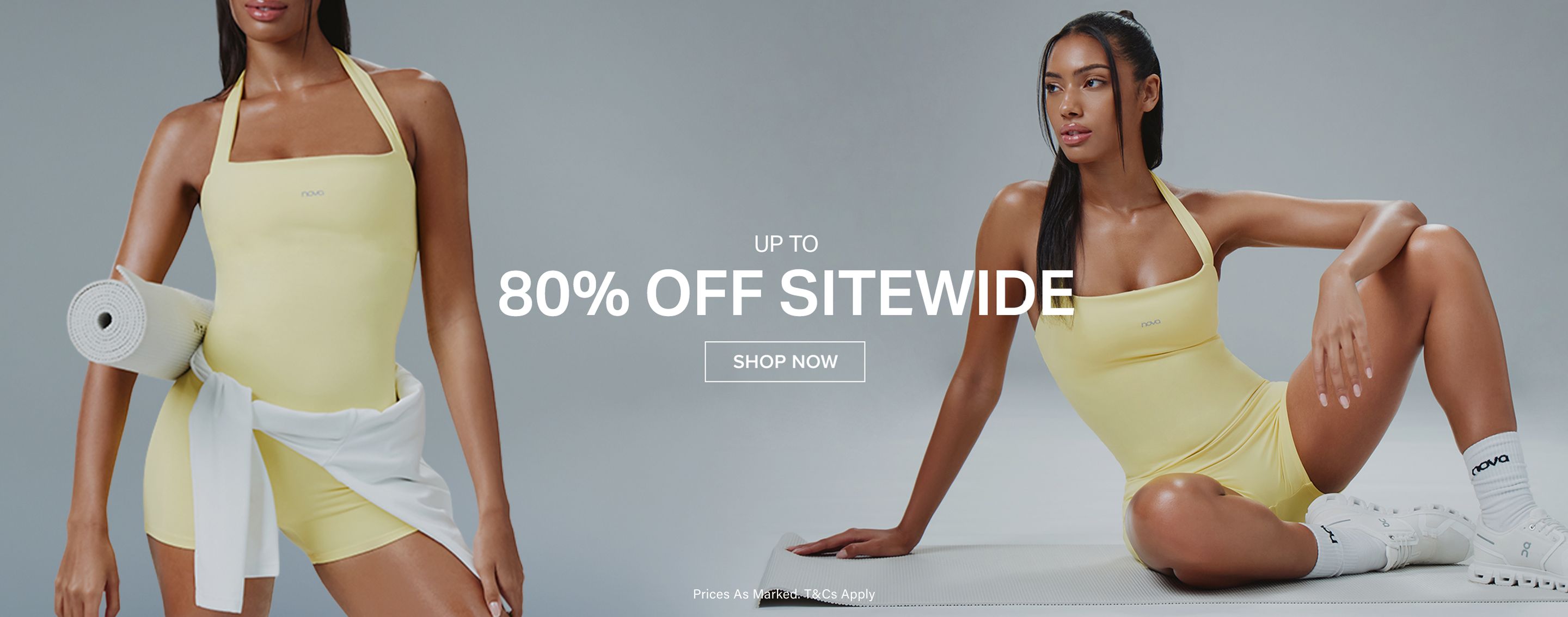 Woman modeling a yellow Nova activewear romper on a grey background, promoting an 80% OFF SITEWIDE sale. Shop Now!