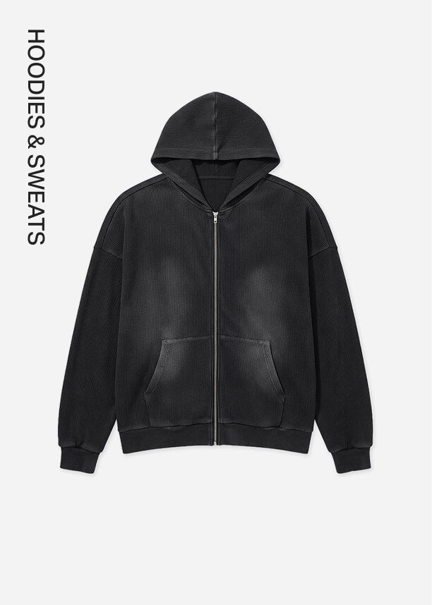 Faded black zip-up hoodie featured in the hoodies & sweats collection category, showcasing comfortable, casual oversized streetwear.