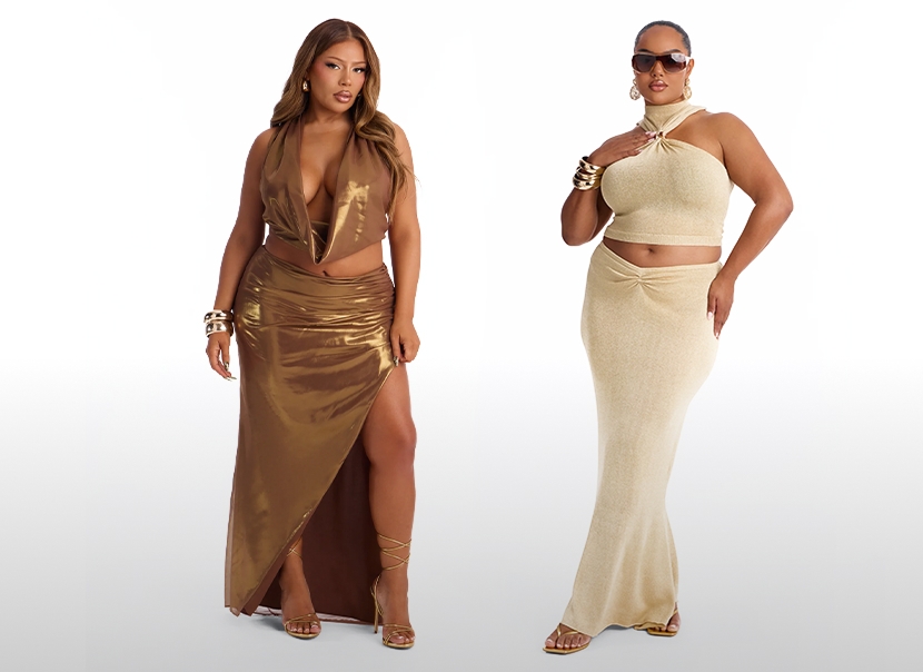 Two models in shimmering gold two-piece sets; one in bronze halter top and high-slit skirt, the other in champagne crop top and fitted maxi skirt. New collection.