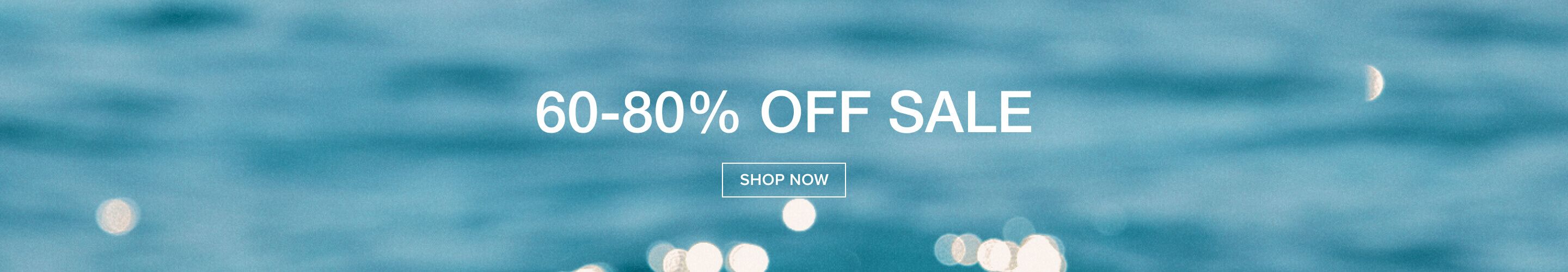 Teal background with blurred lights; white text announces '60-80% OFF SALE' above a 'SHOP NOW' button. Discover great discounts!