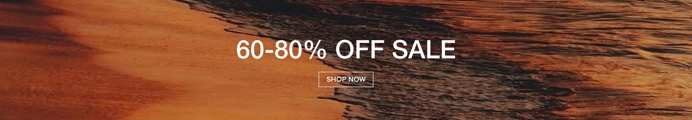 Warm orange-red sunset sky banner with prominent white text: "60-80% OFF SALE." A "SHOP NOW" button encourages users to explore current discounts.