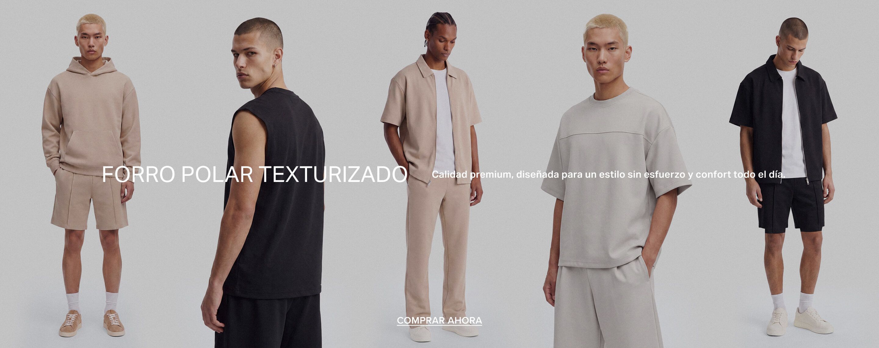 Dos modelos visten forro polar estructurado: chaqueta/shorts negros, camiseta/shorts beige. Promueven estilo y confort premium.