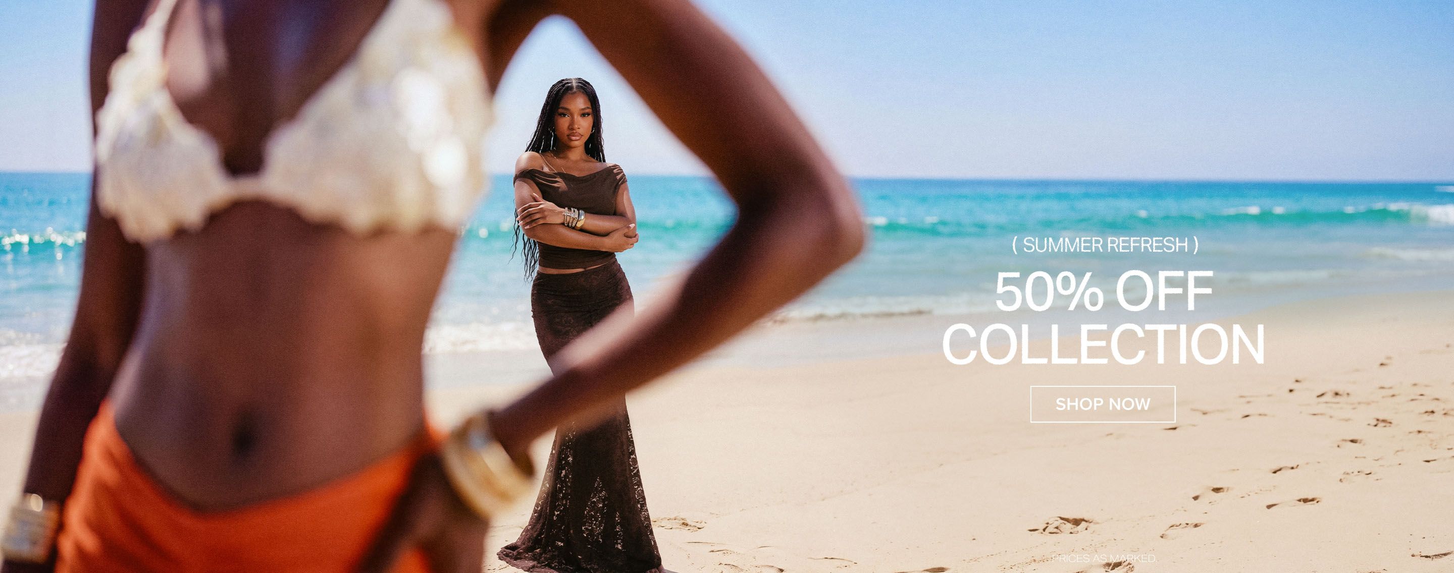Woman in dark brown beach dress on sunny beach, arms crossed, promoting 50% discount on new collection. Shop now!