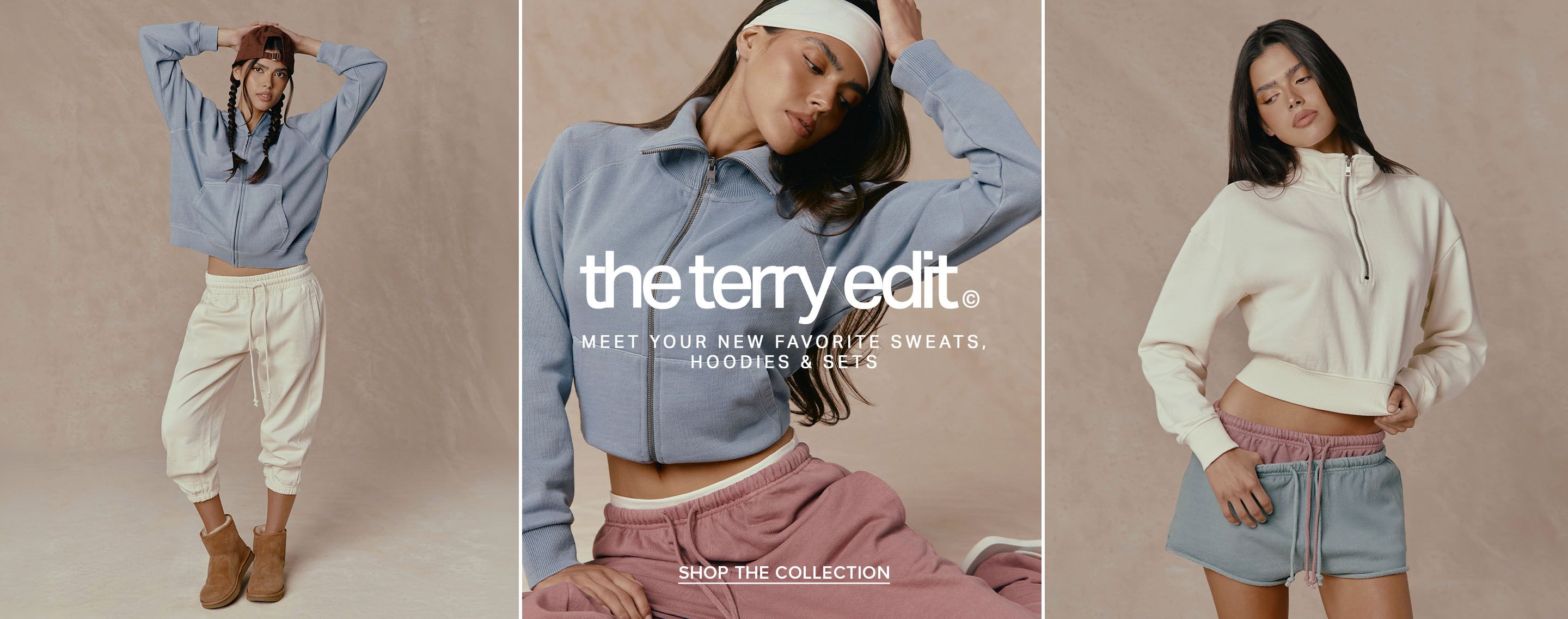 Woman in a blue cropped zip hoodie and pink sweatpants promoting The Terry Edit loungewear collection. Shop sweats, hoodies, and sets.