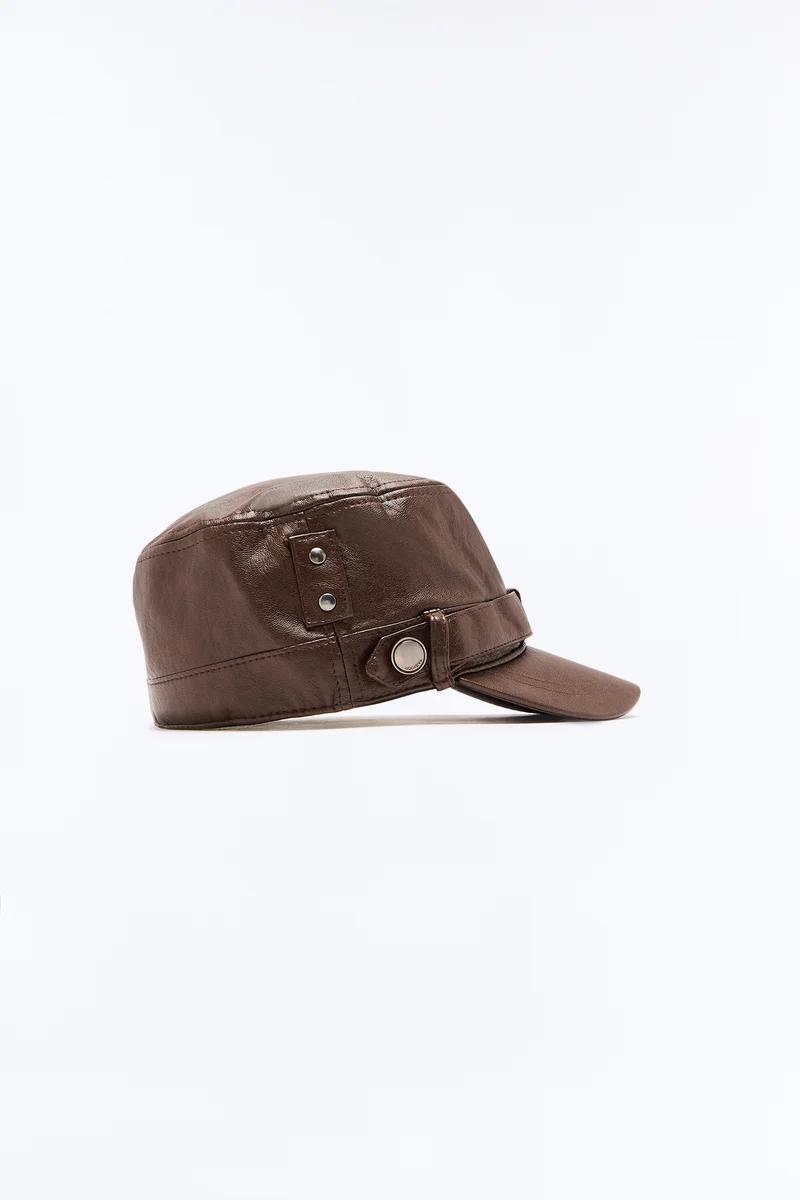 Brown leather military cadet cap with metallic button details.
