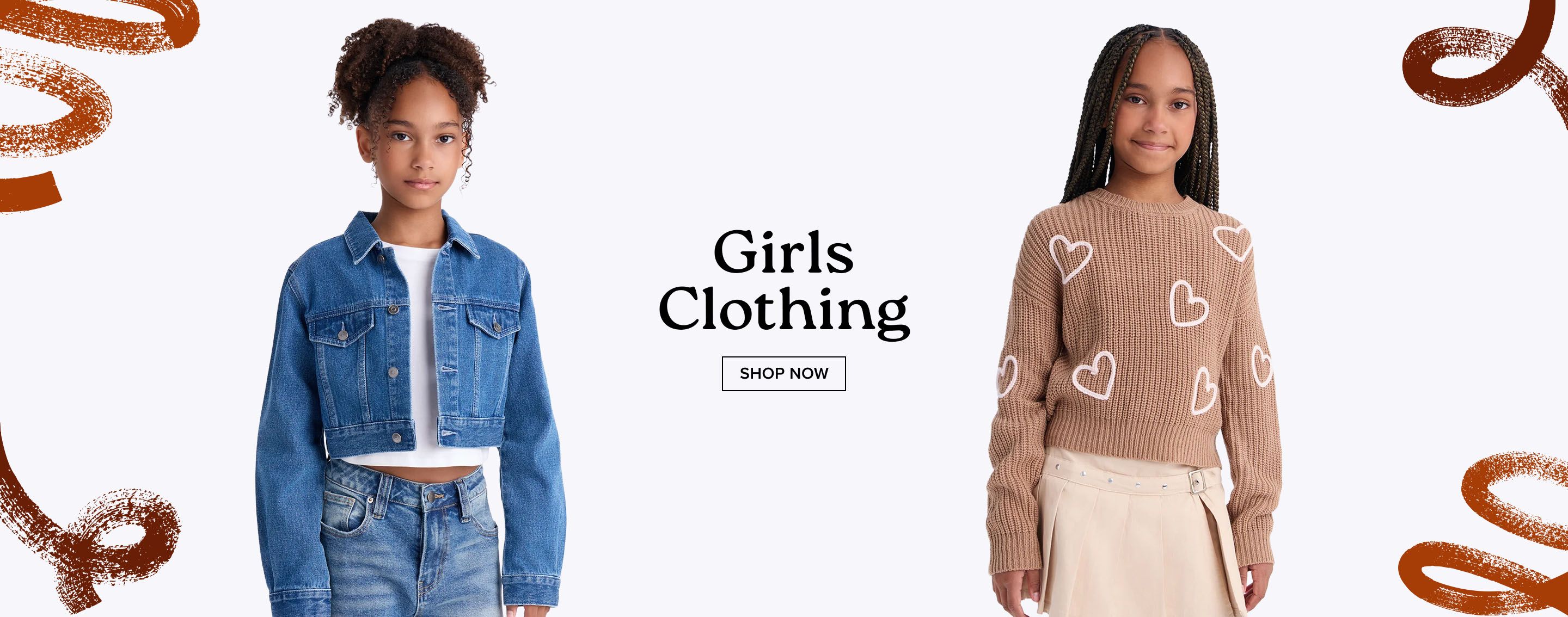 Girl wearing a beige heart knit sweater and tan pleated skirt promoting the girls clothing brand collection with a shop now button.