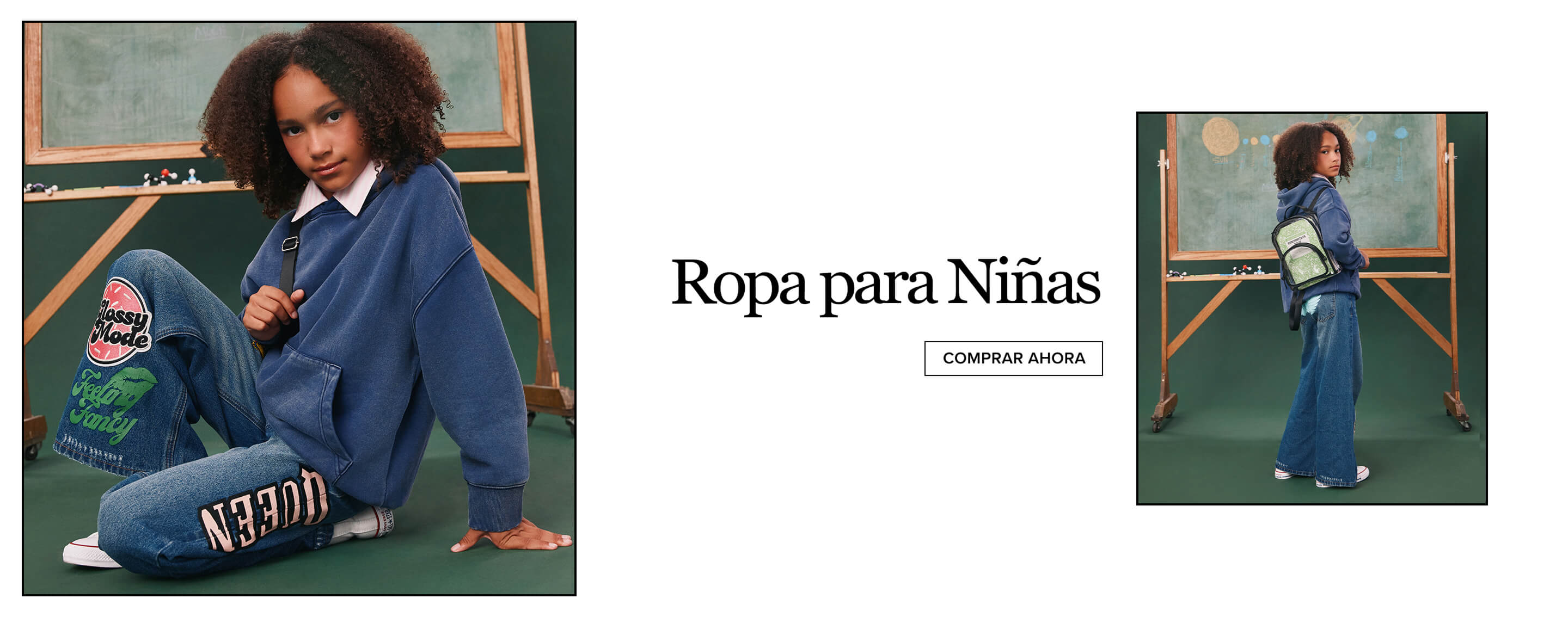 Niña con sudadera azul extragrande y jeans de mezclilla con parches, sentada ante una pizarra verde. Promocionando ropa de niña a la moda.
