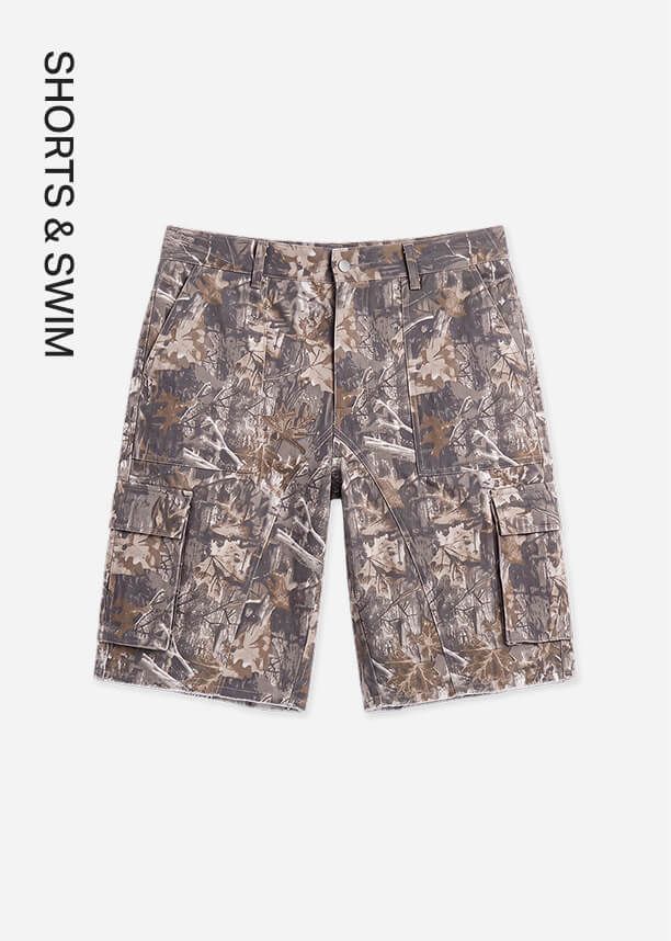 Camouflage cargo shorts in brown, green, and grey, featuring front pockets, promoting the new Shorts & Swim collection.