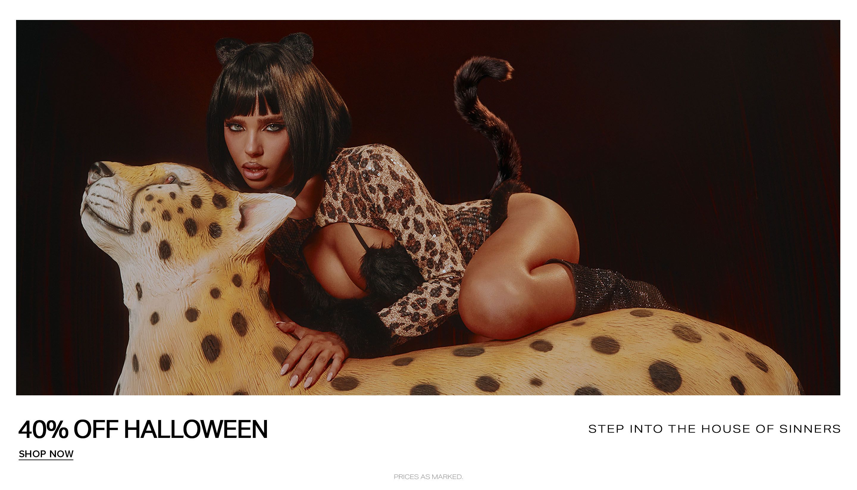 Woman wearing a leopard print cat costume with ears posing on a yellow cheetah statue, promoting a 40% off Halloween fashion sale.