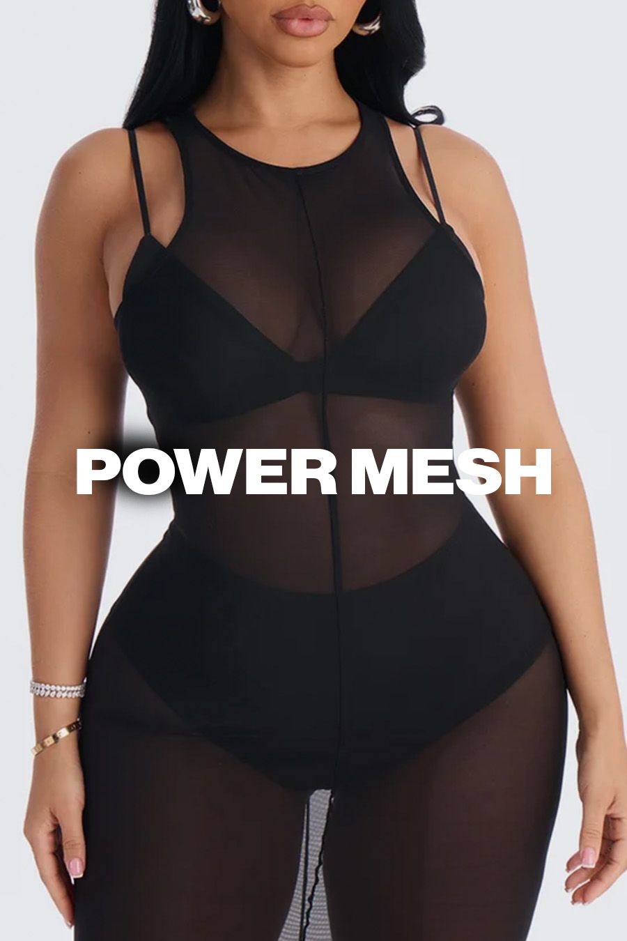 Woman wearing a sheer black mesh bodysuit from the Power Mesh apparel collection, showcasing form-fitting, trendy nightwear fashion for women.
