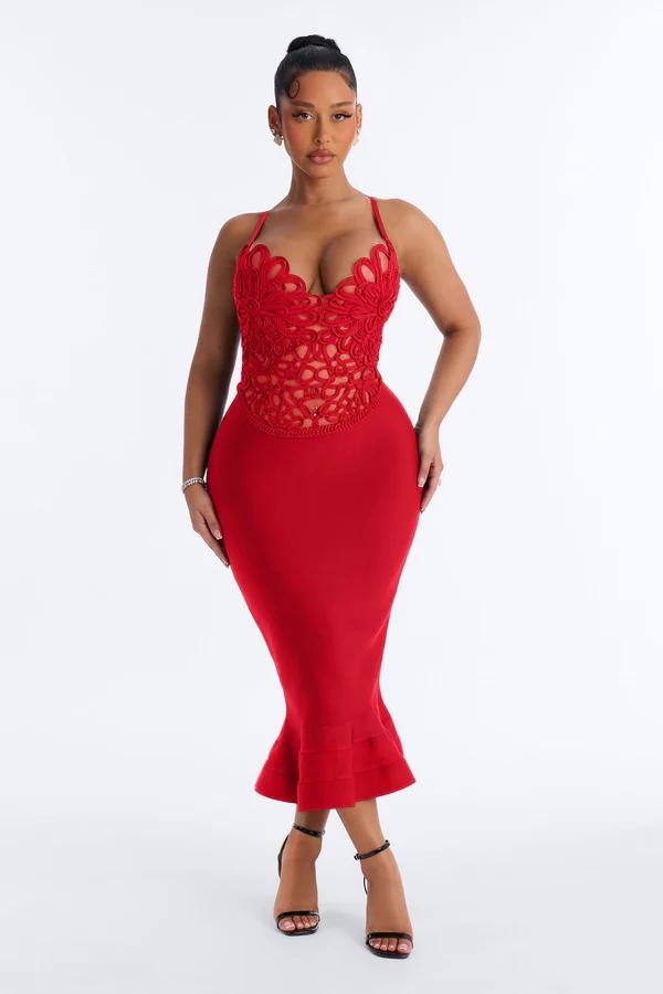 Model poses in an elegant red midi dress with a crochet lace bodice and ruffled mermaid hem, showcasing new e-commerce evening wear.